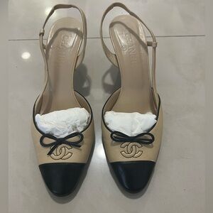 CHANEL Beige and Black Heels with Bow Detail